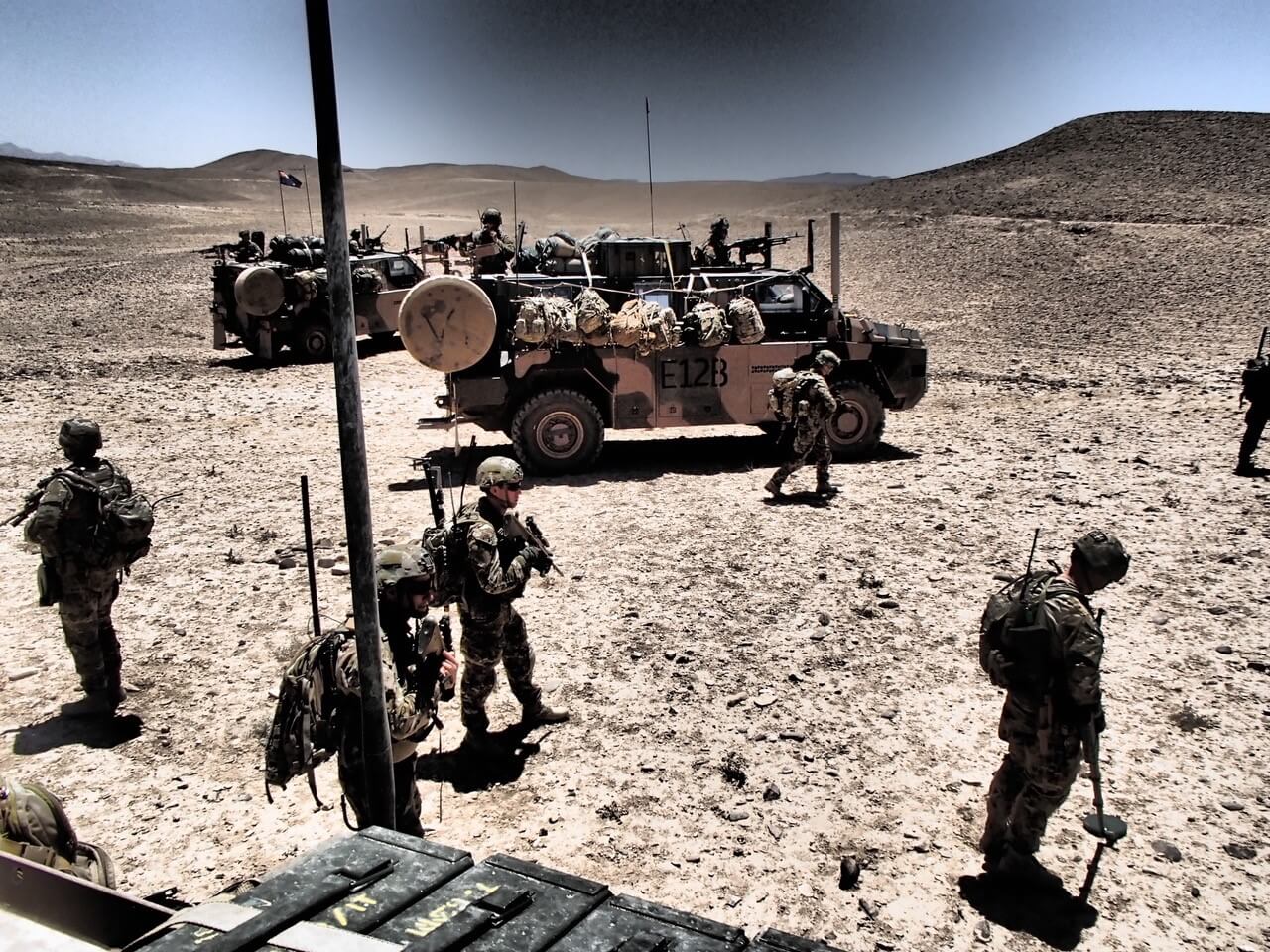 5 Section, 2 Troop and LT Matthew Scott (2 TP COMD) during a 107mm Rocket point of origin exploitation in Afghanistan, 2013.